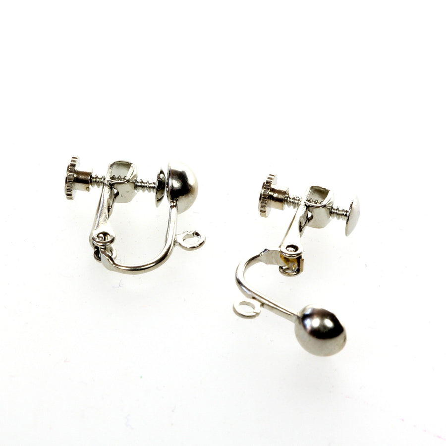 Silver colored ear clips with screw